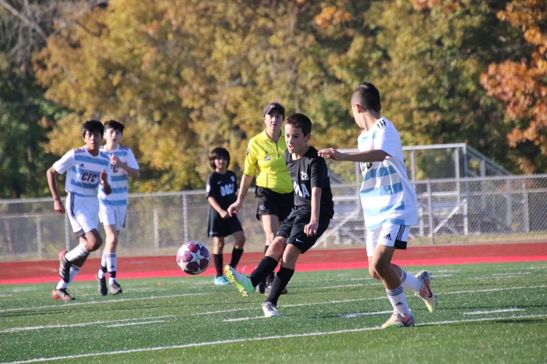 DOCA player striking the ball during a competitive match